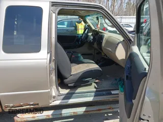 2003 Ford Ranger XL Fleet with VIN 1FTZR45EX3TA42560, listed as a IAAI auction lot 42043472 with 106,051 mi miles and . Bid and sale history available at carsss.com. Image 5.