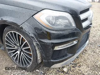 2014 Mercedes-Benz GL-Class GL 550 with VIN 4JGDF7DE1EA274612, listed as a IAAI auction lot 41710174 with 105,094 mi miles. Bid and sale history available at carsss.com. Image 6.