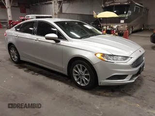 2017 Ford Fusion SE z VIN 3FA6P0H77HR237688, wystawiony jako IAAI lot #41654531 z przebiegiem 156 561 mil mil oraz . Historia ofert i sprzedaży dostępna na DreamBid. Obrazek 1.