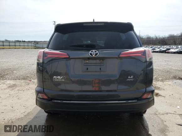 2018 Toyota RAV4 LE with VIN JTMBFREV0JJ235414, listed as a Copart auction lot 49786995 with 70,153 mi miles and Salvage Title. Bid and sale history available at DreamBid. Image 6.