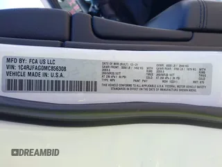 2021 Jeep Grand Cherokee Freedom with VIN 1C4RJFAG0MC856308, listed as a IAAI auction lot 42050995 with 35,428 mi miles and . Bid and sale history available at DreamBid. Image 9.