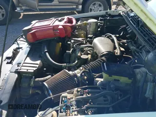 1996 Chevrolet Blazer z VIN 1GNDT13W2T2203227, wystawiony jako IAAI lot #42737848 z przebiegiem 166 855 mil mil oraz . Historia ofert i sprzedaży dostępna na DreamBid. Obrazek 12.