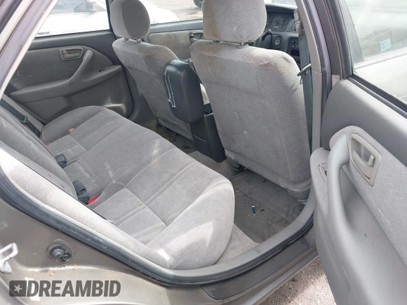 1998 Toyota Camry LE z VIN 4T1BF22K2WU042166, wystawiony jako IAAI lot #42416930 z przebiegiem 124 809 mil mil oraz . Historia ofert i sprzedaży dostępna na DreamBid. Obrazek 8.