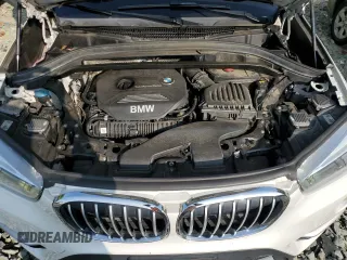 2017 BMW X1 xDrive28i with VIN WBXHT3C33H5F70208, listed as a Copart auction lot 67999764 with 130,341 mi miles and Salvage Title. Bid and sale history available at carsss.com. Image 12.