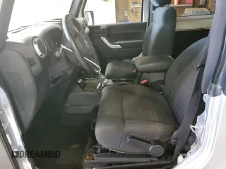 2012 Jeep Wrangler Arctic z VIN 1C4GJWBG2CL237343, wystawiony jako Copart lot #64674015 z przebiegiem 72 750 mil mil oraz Szkoda całkowita • Salvage title. Historia ofert i sprzedaży dostępna na DreamBid. Obrazek 7.