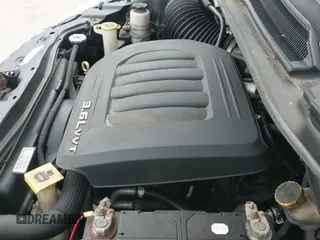 2013 Dodge Grand Caravan SXT with VIN 2C4RDGCG4DR523725, listed as a IAAI auction lot 43455537 with 195,842 mi miles and . Bid and sale history available at DreamBid. Image 13.
