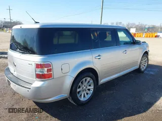 2011 Ford Flex SEL with VIN 2FMGK5CC5BBD28698, listed as a IAAI auction lot 41774174 with 306,974 mi miles. Bid and sale history available at carsss.com. Image 4.