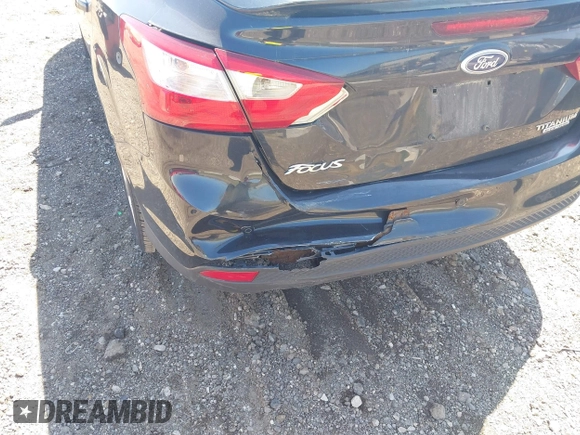 2013 Ford Focus Titanium with VIN 1FADP3J22DL106166, listed as a IAAI auction lot 42233351 with 108,300 mi miles and . Bid and sale history available at carsss.com. Image 6.