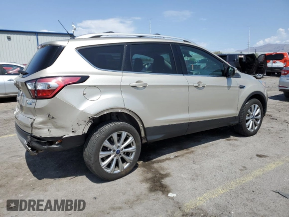 2018 Ford Escape Titanium with VIN 1FMCU9J91JUB44813, listed as a Copart auction lot 59920265 with 63,008 mi miles and Salvage title. Bid and sale history available at DreamBid. Image 3.