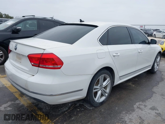 2014 Volkswagen Passat TDI SEL Premium with VIN 1VWCN7A32EC035738, listed as a IAAI auction lot 41641843 with 151,159 mi miles. Bid and sale history available at carsss.com. Image 4.