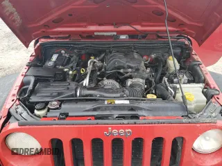 2012 Jeep Wrangler Unlimited Sport z VIN 1C4BJWDG0CL272440, wystawiony jako Copart lot #56044005 z przebiegiem 143 117 mil mil oraz Szkoda całkowita • Salvage title. Historia ofert i sprzedaży dostępna na DreamBid. Obrazek 12.