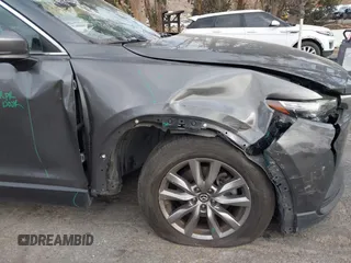 2018 Mazda CX-9 Sport with VIN JM3TCABY1J0224741, listed as a IAAI auction lot 41265876 with 126,686 mi miles and . Bid and sale history available at DreamBid. Image 12.