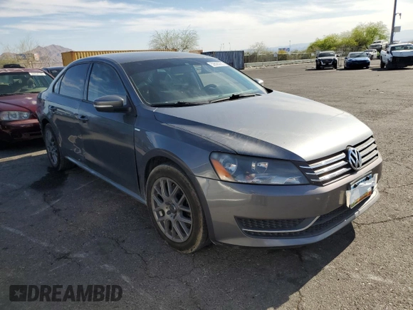 2014 Volkswagen Passat Wolfsburg Edition with VIN 1VWAT7A34EC082377, listed as a Copart auction lot 52820235 with 196,901 mi miles and Salvage title. Bid and sale history available at DreamBid. Image 4.