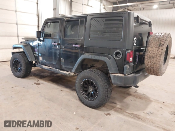 2017 Jeep Wrangler Unlimited Sport with VIN 1C4BJWDGXHL698014, listed as a IAAI auction lot 41384325 with 121,402 mi miles. Bid and sale history available at carsss.com. Image 3.