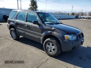2007 Ford Escape XLS z VIN 1FMYU02Z77KA52643, wystawiony jako Copart lot #50971365 z przebiegiem 183 604 mil mil oraz Szkoda całkowita • Salvage title. Historia ofert i sprzedaży dostępna na DreamBid. Obrazek 4.