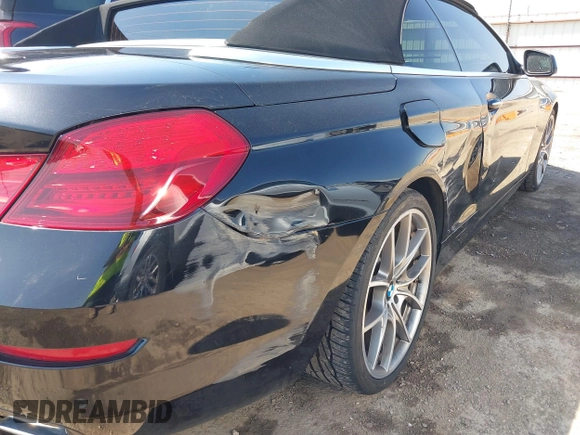2012 BMW 6 Series 650i with VIN WBALZ3C53CC397604, listed as a IAAI auction lot 41881996 with 96,175 mi miles and . Bid and sale history available at carsss.com. Image 17.