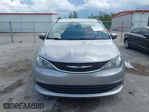 2017 Chrysler Pacifica Touring with VIN 2C4RC1DG7HR516711, listed as a IAAI auction lot 42633544 with 97,853 mi miles and . Bid and sale history available at DreamBid. Image 12.