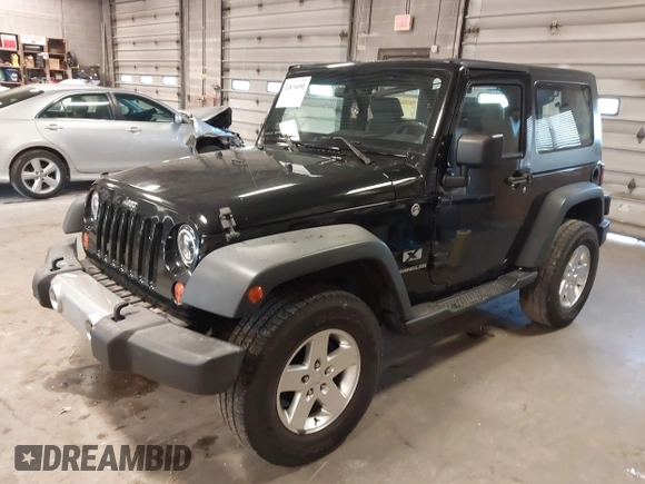 2007 Jeep Wrangler X with VIN 1J8FA24167L230763, listed as a IAAI auction lot 41876090 with 130,136 mi miles and . Bid and sale history available at carsss.com. Image 17.
