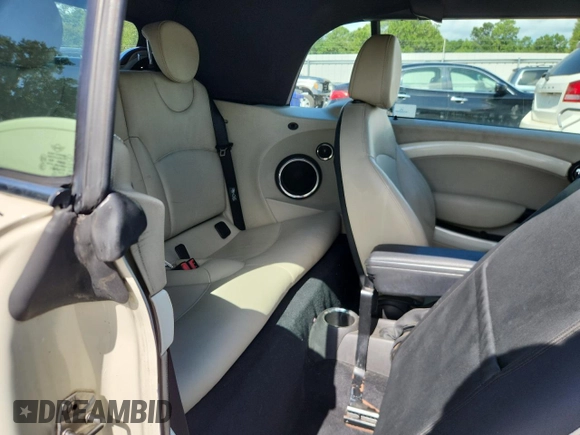 2011 MINI Convertible with VIN WMWZN3C59BTZ78433, listed as a Copart auction lot 65509575 with 102,800 mi miles and Clean title. Bid and sale history available at DreamBid. Image 10.