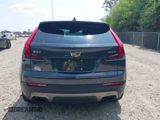 2019 Cadillac XT4 FWD Premium Luxury z VIN 1GYFZCR43KF143980, wystawiony jako IAAI lot #42472400 z przebiegiem 36 496 mil mil oraz . Historia ofert i sprzedaży dostępna na DreamBid. Obrazek 16.