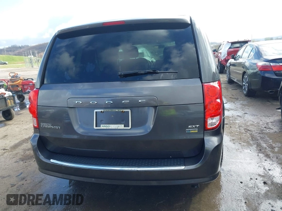 2015 Dodge Grand Caravan SXT with VIN 2C4RDGCG8FR541373, listed as a IAAI auction lot 41990500 with 114,100 mi miles and . Bid and sale history available at DreamBid. Image 16.
