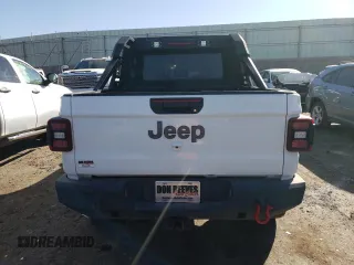 2020 Jeep Gladiator Rubicon with VIN 1C6JJTBG7LL152204, listed as a Copart auction lot 83525554 with 7,030 mi miles and Salvage title. Bid and sale history available at DreamBid. Image 6.