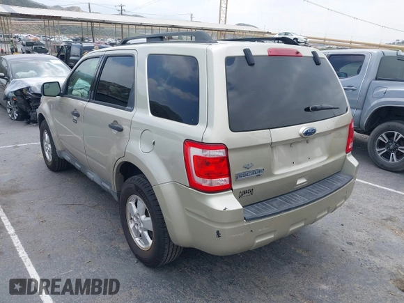 2012 Ford Escape XLT with VIN 1FMCU0D74CKA07739, listed as a IAAI auction lot 42100820 with 308,265 mi miles. Bid and sale history available at carsss.com. Image 3.