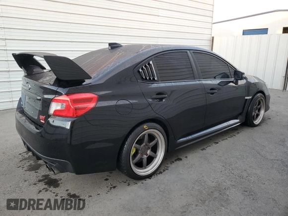 2019 Subaru WRX STI with VIN JF1VA2S68K9802381, listed as a Copart auction lot 87599415 with 82,427 mi miles and Clean Title. Bid and sale history available at carsss.com. Image 3.