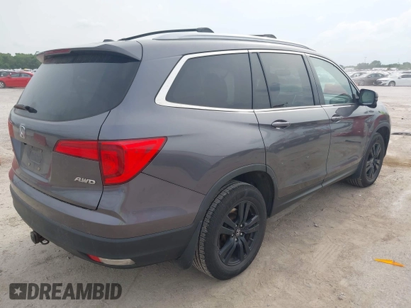 2017 Honda Pilot EX-L with VIN 5FNYF6H53HB038128, listed as a IAAI auction lot 42300311 with 176,928 mi miles and . Bid and sale history available at DreamBid. Image 4.