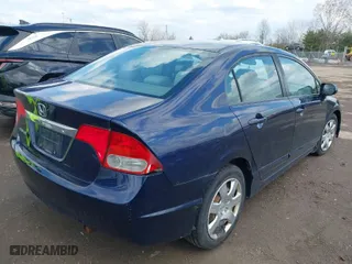 2010 Honda Civic Sdn LX with VIN 19XFA1F53AE017304, listed as a IAAI auction lot 42003547 with 128,559 mi miles. Bid and sale history available at carsss.com. Image 4.