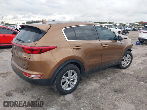 2018 Kia Sportage LX with VIN KNDPM3AC9J7481047, listed as a IAAI auction lot 41636184 with 160,385 mi miles. Bid and sale history available at carsss.com. Image 4.
