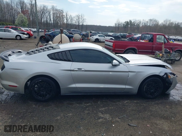 2015 Ford Mustang V6 with VIN 1FA6P8AM3F5348012, listed as a IAAI auction lot 41910661 with 144,584 mi miles and . Bid and sale history available at DreamBid. Image 13.