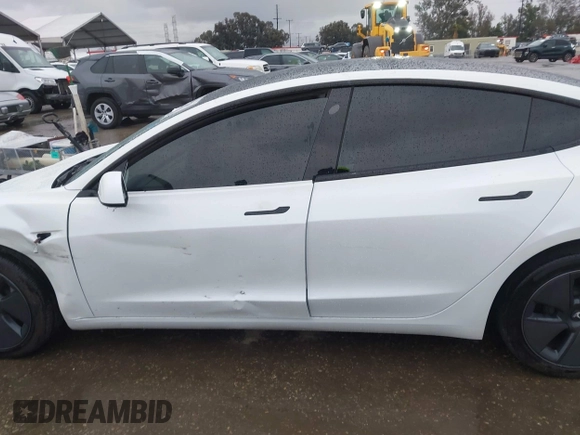 2023 Tesla Model 3 with VIN 5YJ3E1EA8PF578199, listed as a IAAI auction lot 41735465 with 50,823 mi miles and . Bid and sale history available at DreamBid. Image 14.