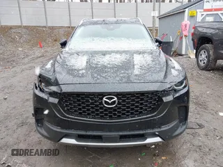 2024 Mazda CX-50 Premium z VIN 7MMVABDYXRN180263, wystawiony jako IAAI lot #41738791 z przebiegiem 9 688 mil mil oraz . Historia ofert i sprzedaży dostępna na DreamBid. Obrazek 12.