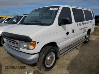 2000 Ford Econoline Passenger XL with VIN 1FBSS31L1YHB80264, listed as a Copart auction lot 74762814 with 61,702 mi miles and Salvage Title. Bid and sale history available at DreamBid. Image 1.