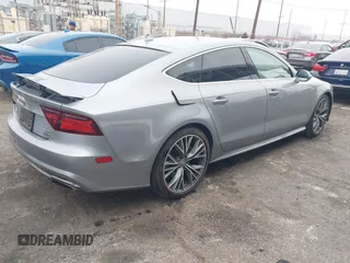 2016 Audi A7 3.0 Premium Plus with VIN WAUWGAFC0GN003357, listed as a IAAI auction lot 41468854 with 62,590 mi miles. Bid and sale history available at carsss.com. Image 4.