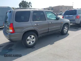 2003 Mazda Tribute LX with VIN 4F2YZ04193KM08890, listed as a IAAI auction lot 42158385 with 282,314 mi miles and . Bid and sale history available at carsss.com. Image 4.