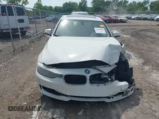 2014 BMW 3 Series 328d with VIN WBA3D3C58EK154684, listed as a IAAI auction lot 42586949 with 125,351 mi miles and . Bid and sale history available at DreamBid. Image 12.