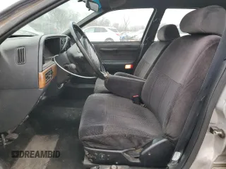 1991 Ford Taurus with VIN 1FACP52U9MG101093, listed as a Copart auction lot 45948105 with 594,696 mi miles and Salvage title. Bid and sale history available at DreamBid. Image 7.