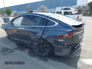 2019 Tesla Model X 75D with VIN 5YJXCBE23KF183801, listed as a IAAI auction lot 41757119 with Not Provided miles and . Bid and sale history available at carsss.com. Image 3.