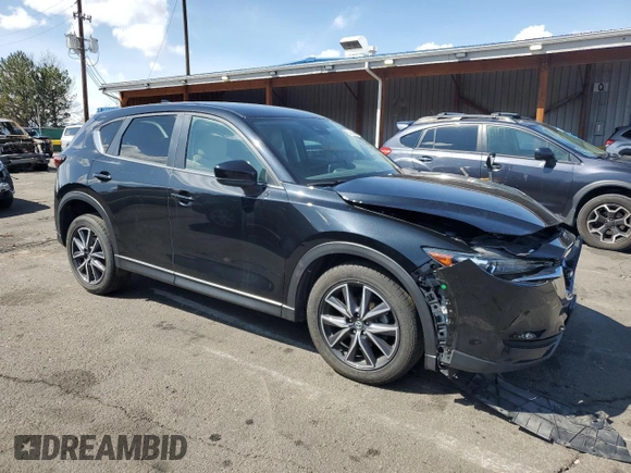 2018 Mazda CX-5 Touring with VIN JM3KFBCM4J0466234, listed as a Copart auction lot 51617095 with 58,200 mi miles and Salvage Title. Bid and sale history available at carsss.com. Image 4.