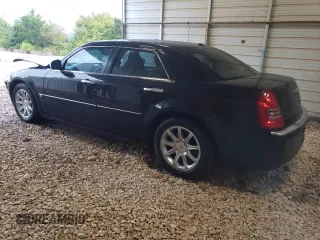 2006 Chrysler 300 C with VIN 2C3KA63H66H400714, listed as a Copart auction lot 71831914 with 288,577 mi miles and Salvage Title. Bid and sale history available at carsss.com. Image 2.