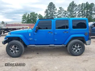 2016 Jeep Wrangler Unlimited 75th Anniversary with VIN 1C4HJWEG0GL154418, listed as a IAAI auction lot 42192717 with 102,514 mi miles and . Bid and sale history available at DreamBid. Image 14.