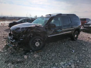 2004 GMC Envoy SLT with VIN 1GKET16S346102721, listed as a Copart auction lot 82628164 with 213,074 mi miles and Salvage Title. Bid and sale history available at DreamBid. Image 1.