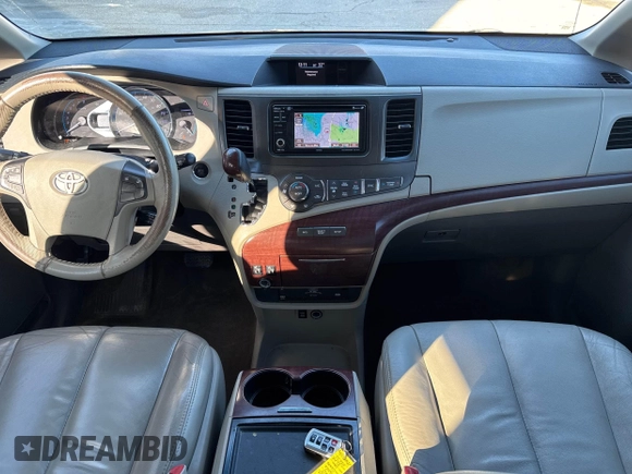 2013 Toyota Sienna XLE with VIN 5TDDK3DC3DS052713, listed as a IAAI auction lot 41451844 with 284,884 mi miles and . Bid and sale history available at DreamBid. Image 6.