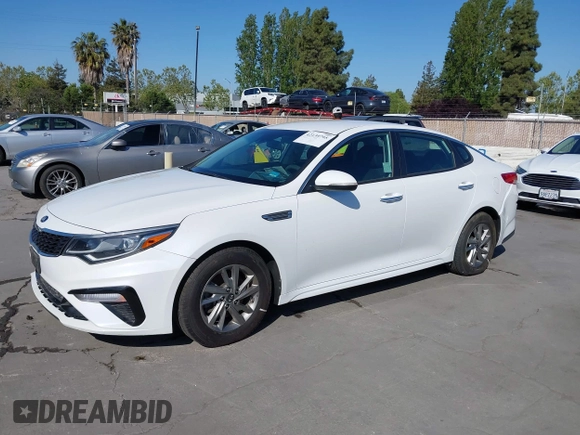 2019 Kia Optima LX with VIN 5XXGT4L33KG324175, listed as a IAAI auction lot 42139795 with 105,273 mi miles. Bid and sale history available at carsss.com. Image 17.