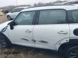 2014 MINI Countryman S with VIN WMWZC3C55EWP52138, listed as a IAAI auction lot 40695292 with 83,083 mi miles and . Bid and sale history available at DreamBid. Image 14.