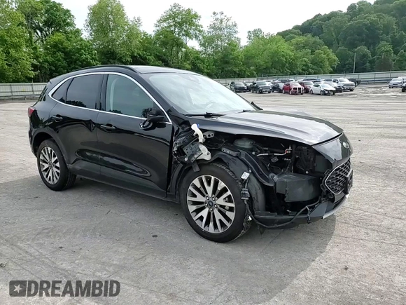 2021 Ford Escape Titanium with VIN 1FMCU9J97MUA57521, listed as a Copart auction lot 58714055 with 83,201 mi miles and Salvage title. Bid and sale history available at DreamBid. Image 15.