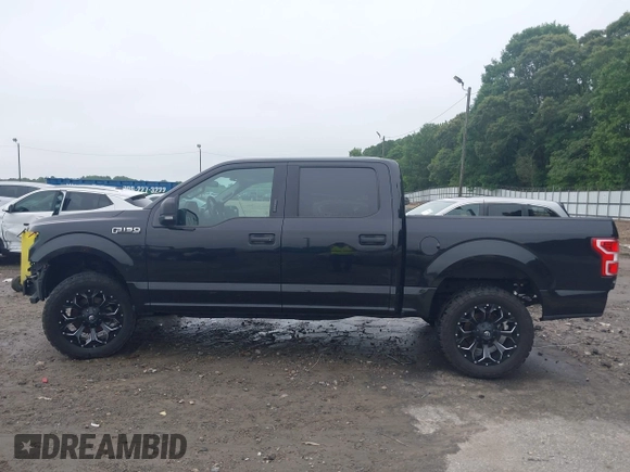 2019 Ford F-150 XL with VIN 1FTEW1C43KFC10164, listed as a IAAI auction lot 42342646 with 93,377 mi miles and . Bid and sale history available at DreamBid. Image 15.