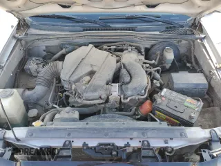 2007 Toyota Tacoma z VIN 5TEMU52N27Z381856, wystawiony jako Copart lot #52943985 z przebiegiem 241 481 mil mil oraz Szkoda całkowita • Salvage title. Historia ofert i sprzedaży dostępna na DreamBid. Obrazek 13.
